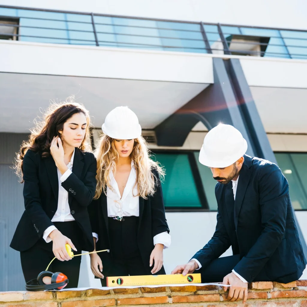Architects and contractors collaborating on projects, representing specialized local seo and web development for construction businesses.